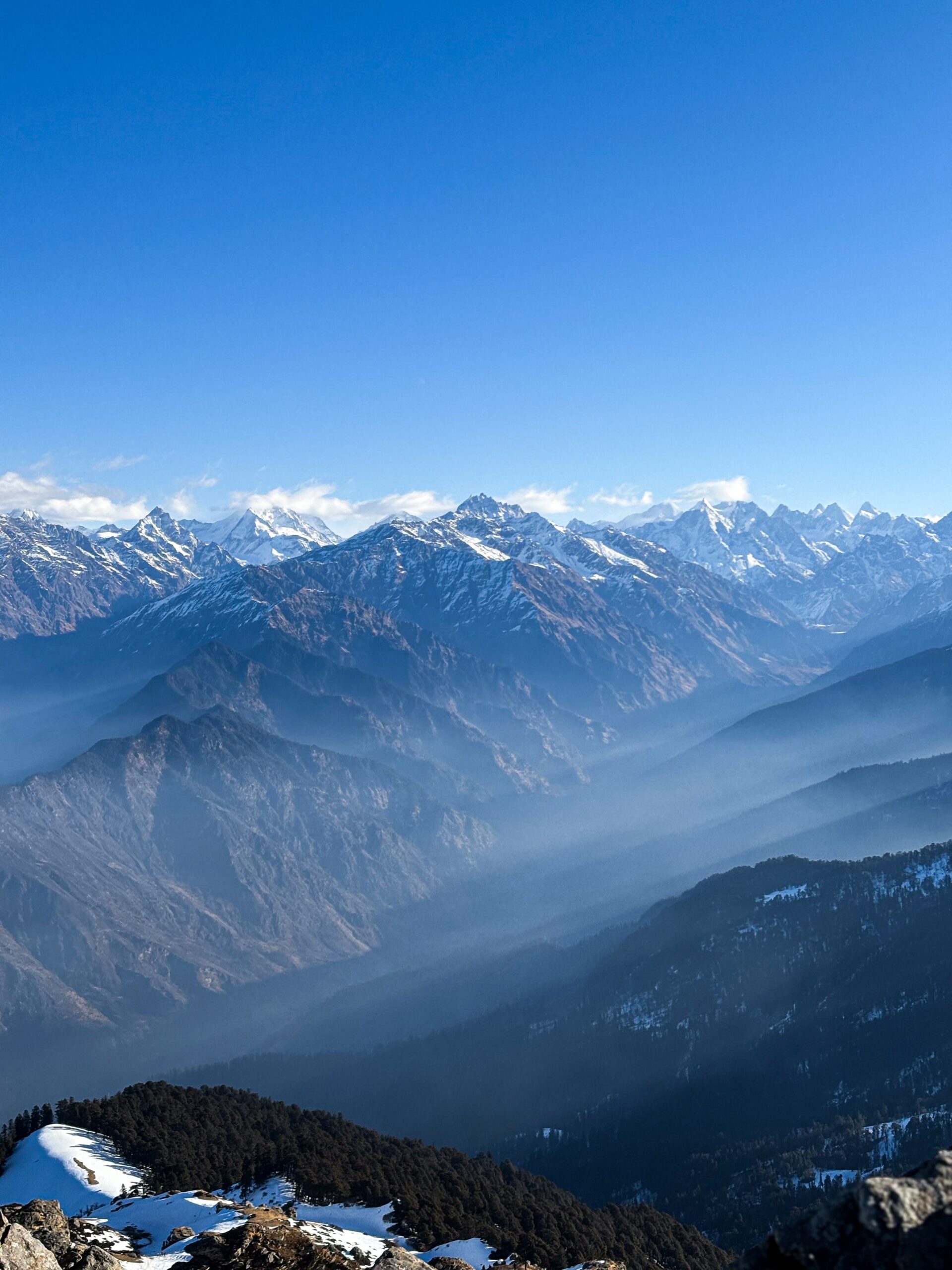 Stunning view of the Himalayan mountains in Uttarkashi, India on a clear day.